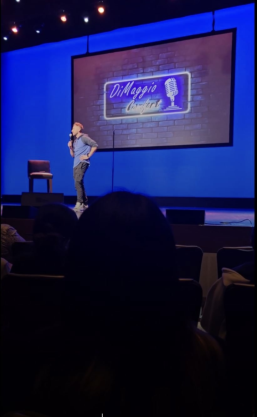 DiMaggio performing at Cabaret Theater at Mohegan Sun with his name projected behind him