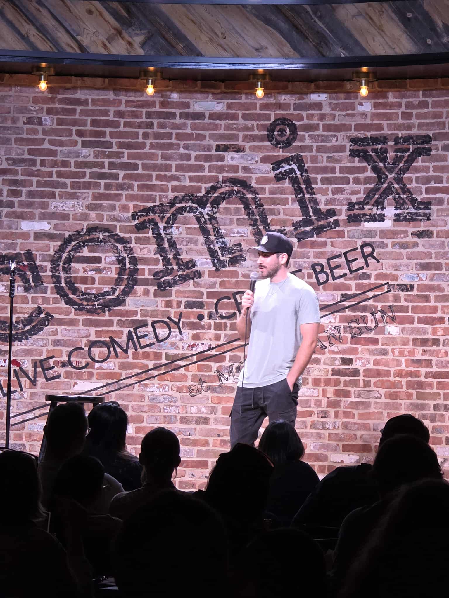 DiMaggio performing stand-up at Comix Roadhouse